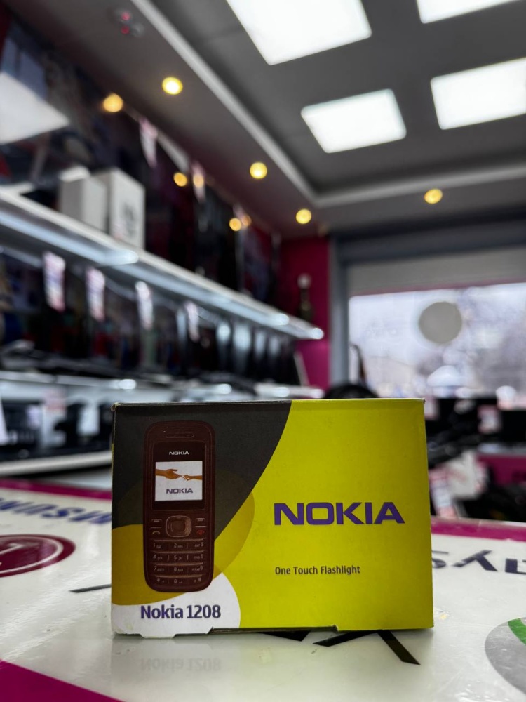 Мобильный телефон Nokia 1208
