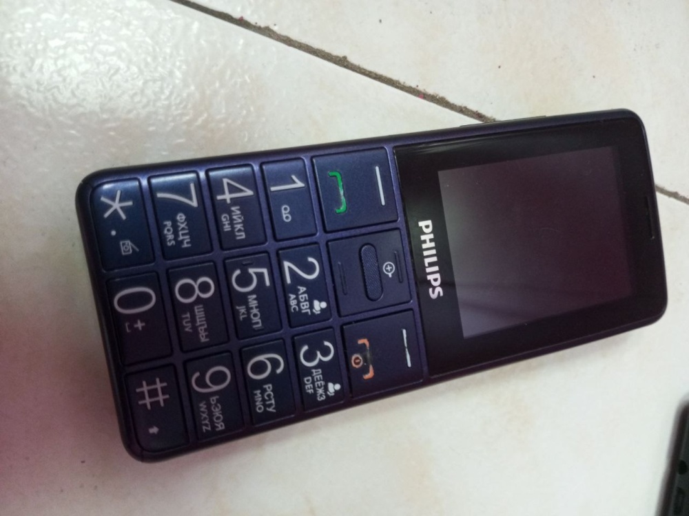 Мобильный телефон Philips e311